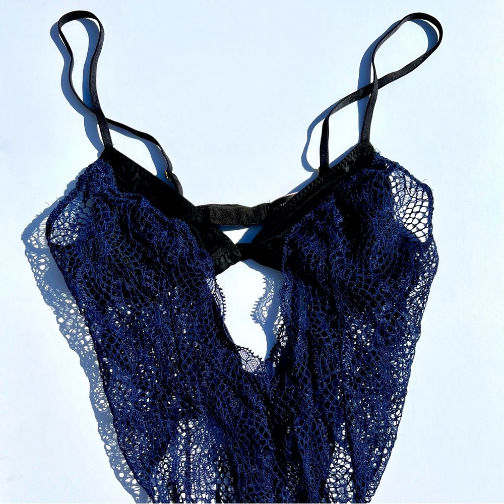 Victoria’s Secret navy blue detailed fishnet teddy in size Medium.